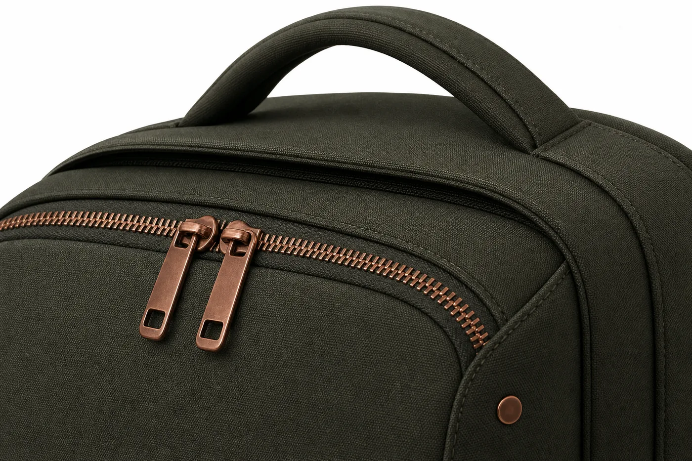 Close-up of premium zipper and handle detailing on business backpack