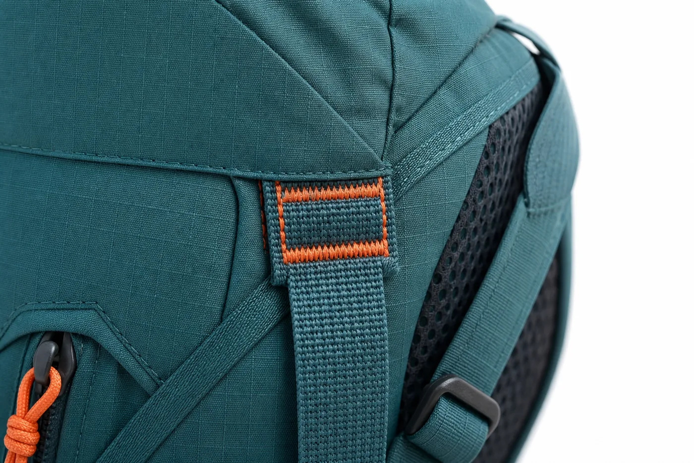Close-up of ripstop fabric and reinforced stitching on hiking bag